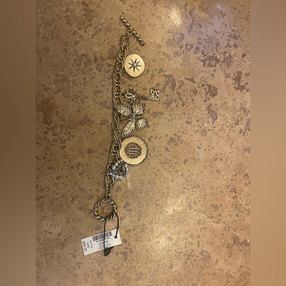 Beautiful brass charm bracelet. Brand new with tag.